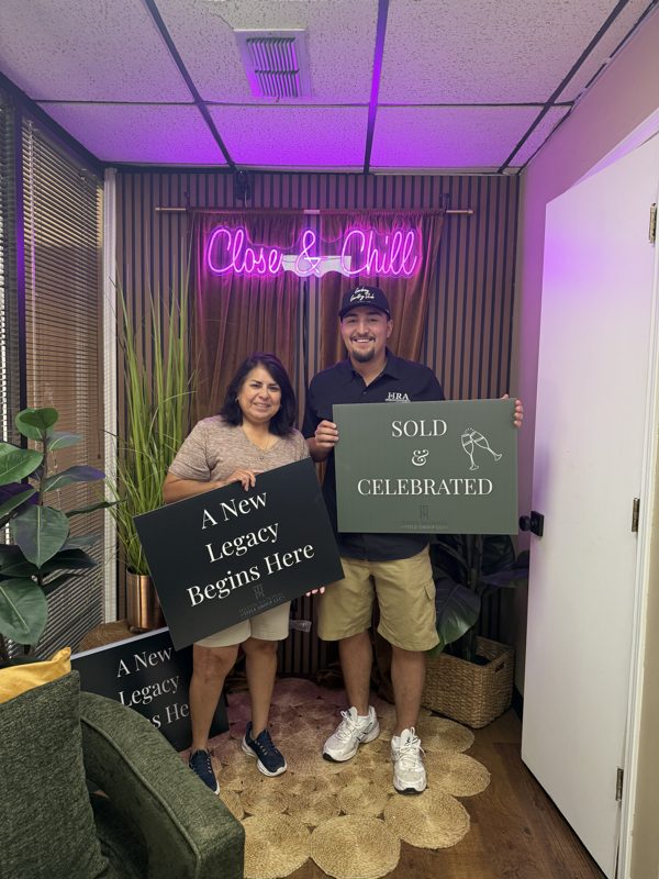 HRA Signature Properties closing with a local seller