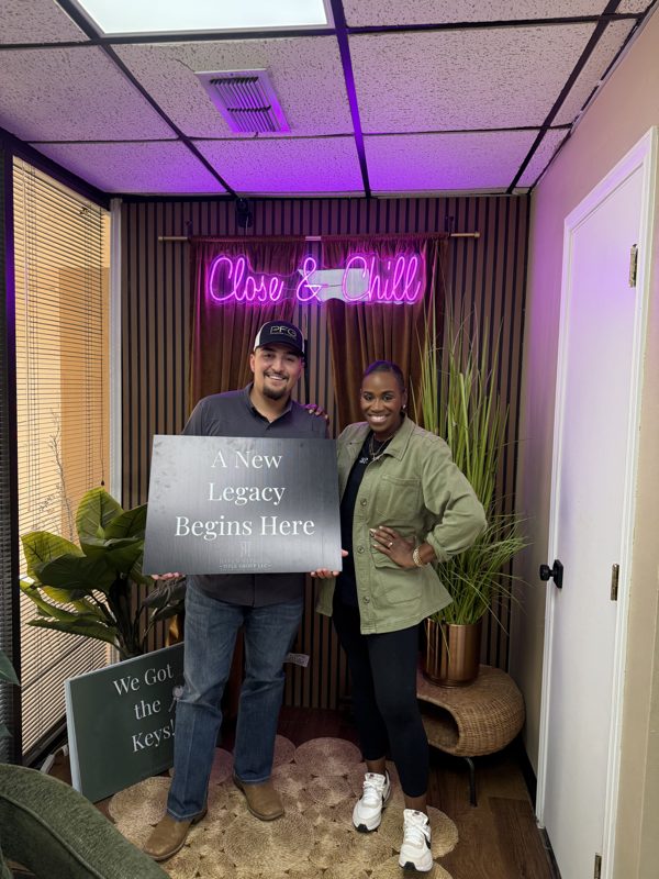 HRA Signature Properties closing with a local seller